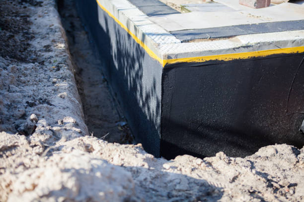 Professional Waterproofing technician working in Cambridge, IL